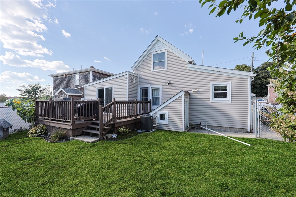 22 Rock Street Acushnet, MA 02743 - Photo 36 of 41 a view of a house with a yard and deck