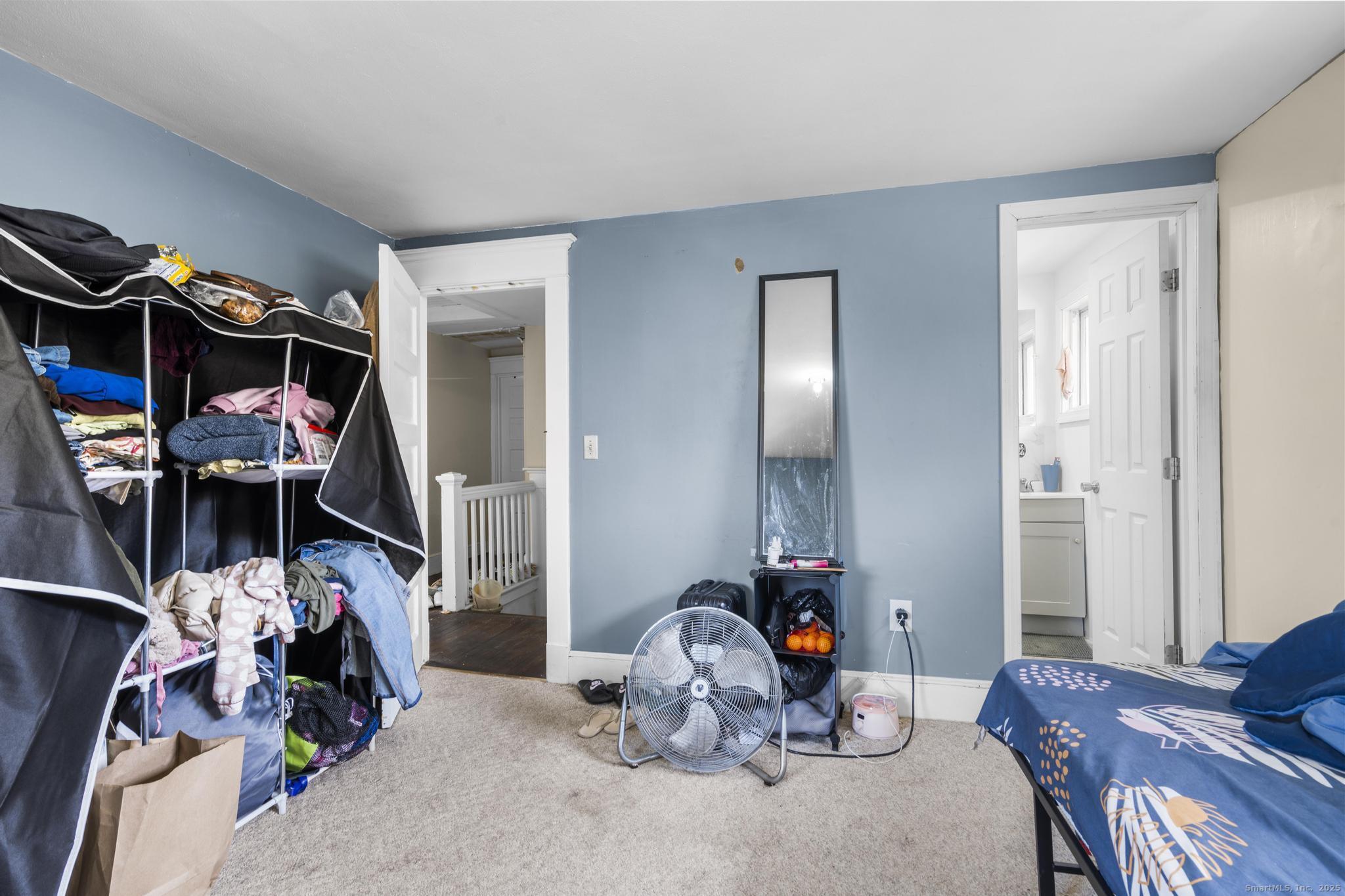 699 Forest Road West Haven, CT 06516 - Photo 20 of 28 a room with furniture