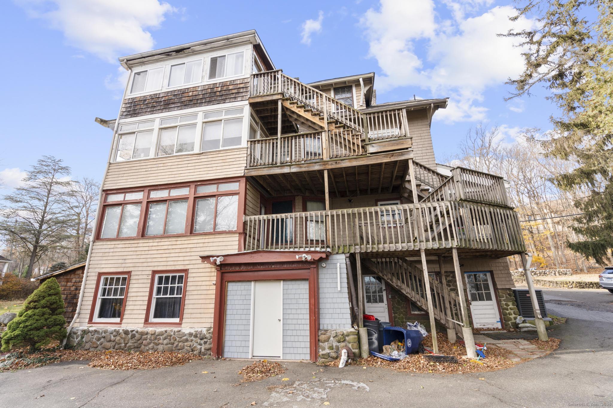 699 Forest Road West Haven, CT 06516 - Photo 27 of 28 a view of a house with a parking space