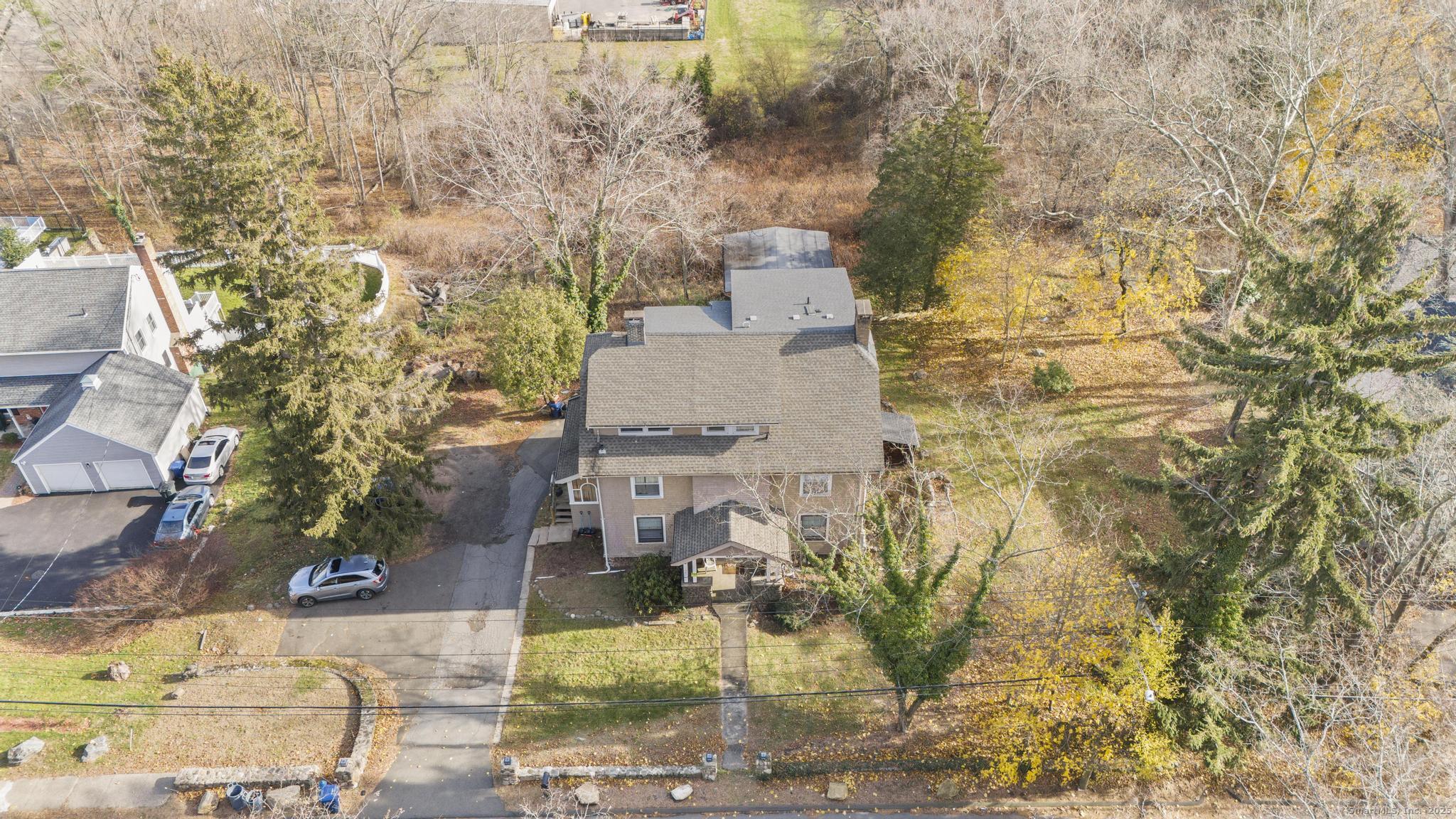 699 Forest Road West Haven, CT 06516 - Photo 5 of 28 an aerial view of residential houses with outdoor space