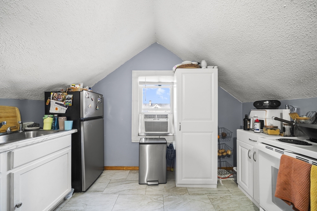 708-710 Carew Street Springfield, MA 01104 - Photo 35 of 38 a room with storage and utility