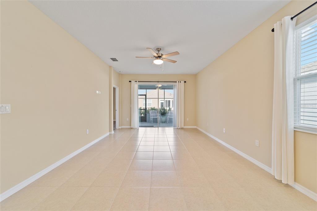 9776 Southwest 100th Avenue Ocala, FL 34481 - Photo 15 of 52 a view of an empty room with a window
