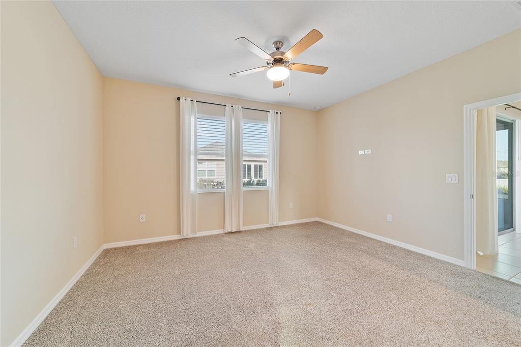 9776 Southwest 100th Avenue Ocala, FL 34481 - Photo 32 of 52 an empty room with a window