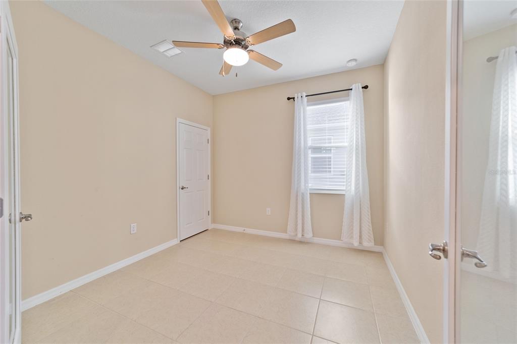 9776 Southwest 100th Avenue Ocala, FL 34481 - Photo 41 of 52 a view of an empty room with a window