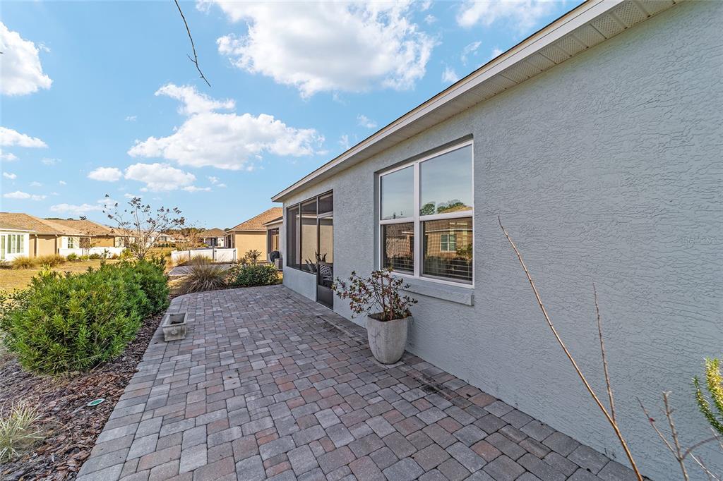 9776 Southwest 100th Avenue Ocala, FL 34481 - Photo 48 of 52 a view of a house with backyard and garden