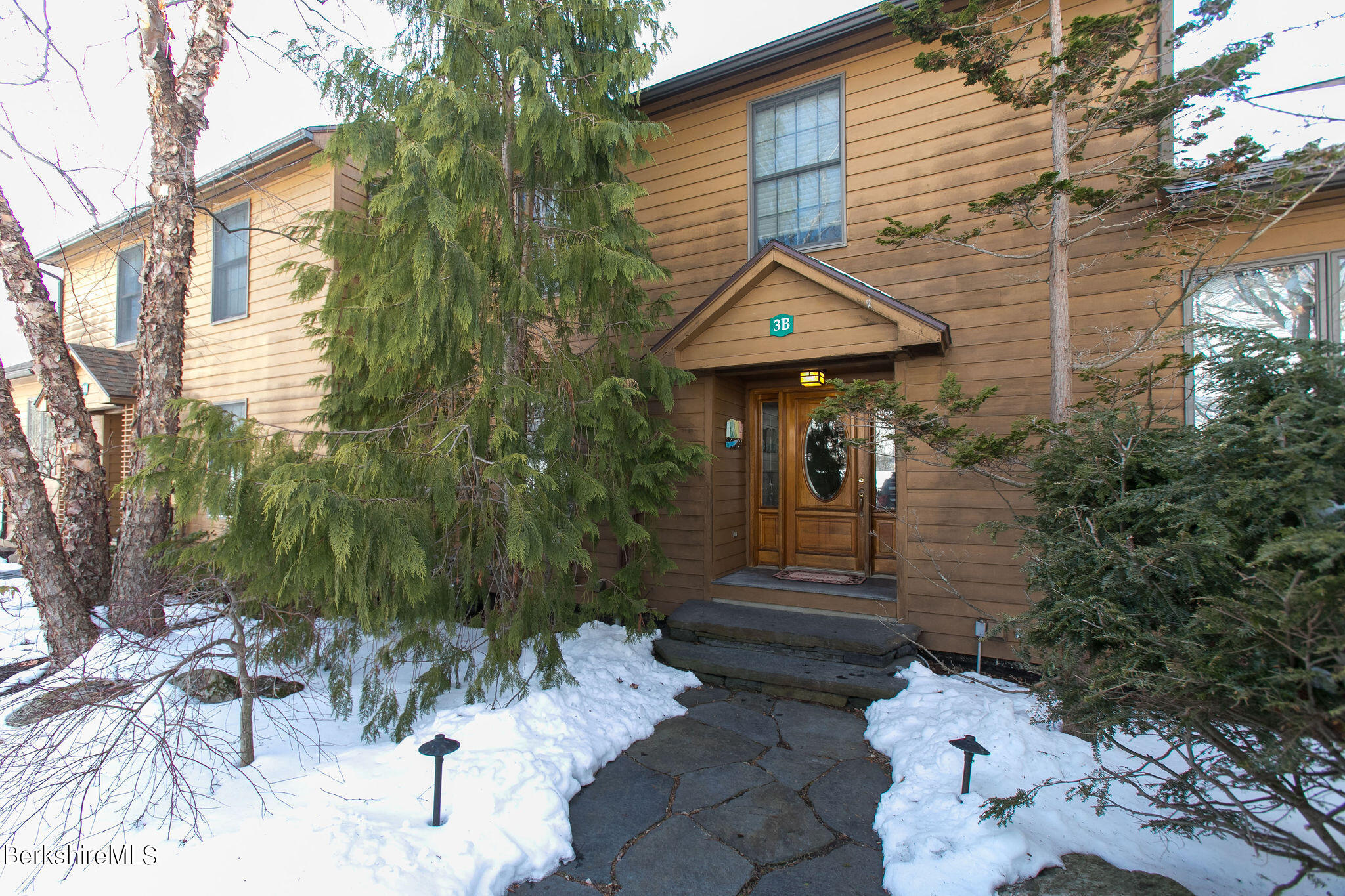 200 Old Stockbridge Road, Unit 3B Lenox, MA 01240 - Photo 1 of 36 a view of a pathway with a house in the background