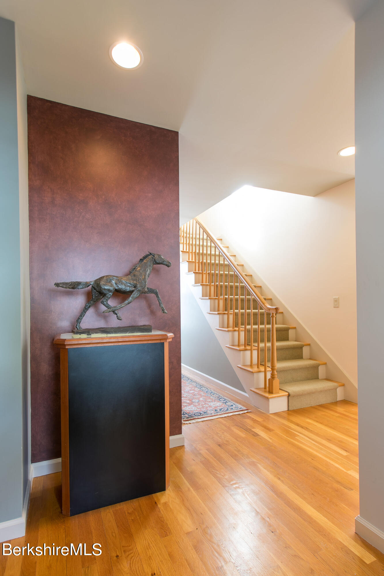 200 Old Stockbridge Road, Unit 3B Lenox, MA 01240 - Photo 18 of 36 a view of entryway and hall with wooden floor