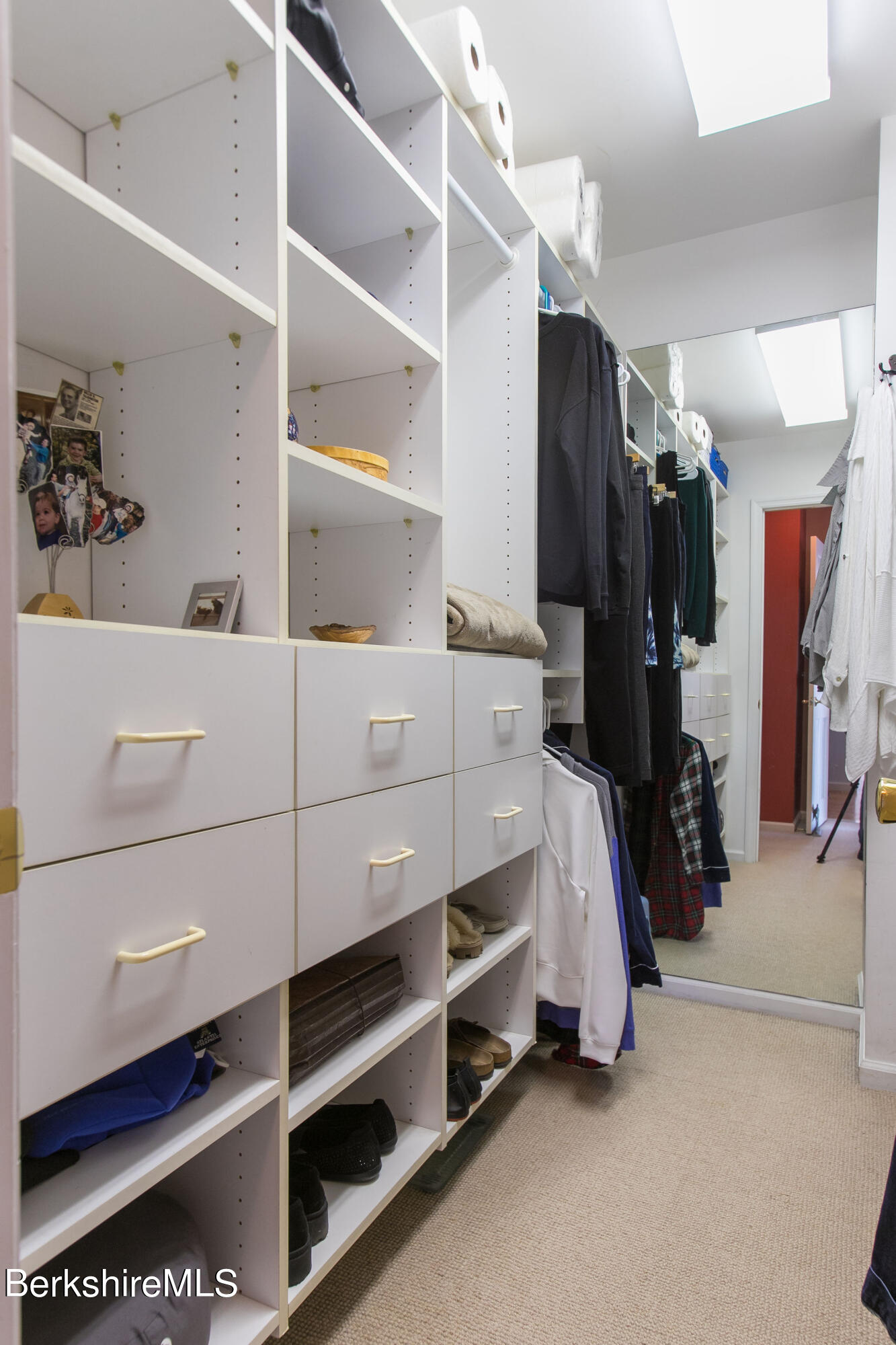 200 Old Stockbridge Road, Unit 3B Lenox, MA 01240 - Photo 20 of 36 a view of walk in closet with clothes and shoes