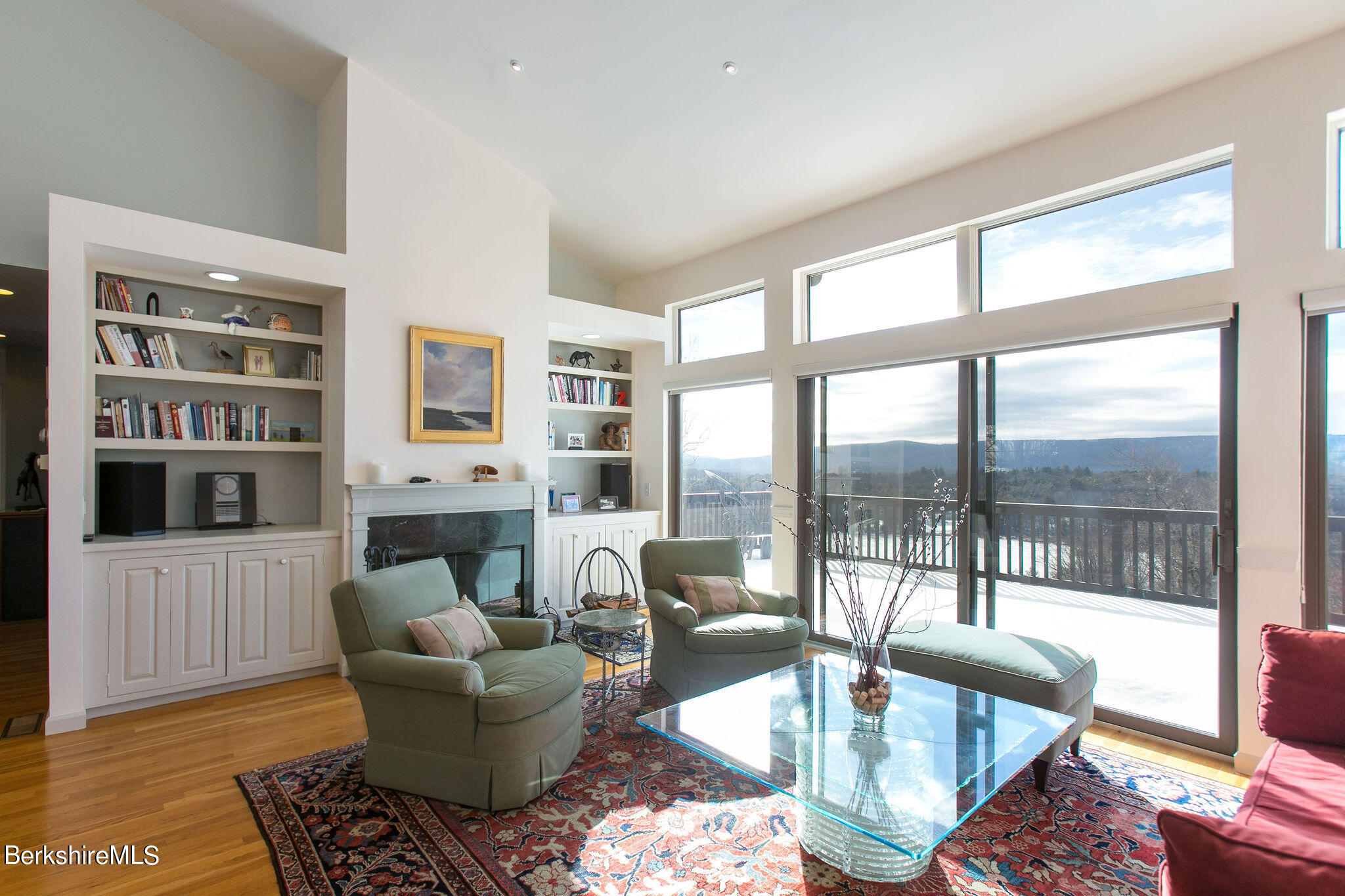 200 Old Stockbridge Road, Unit 3B Lenox, MA 01240 - Photo 2 of 36 a living room with fireplace furniture and a floor to ceiling window