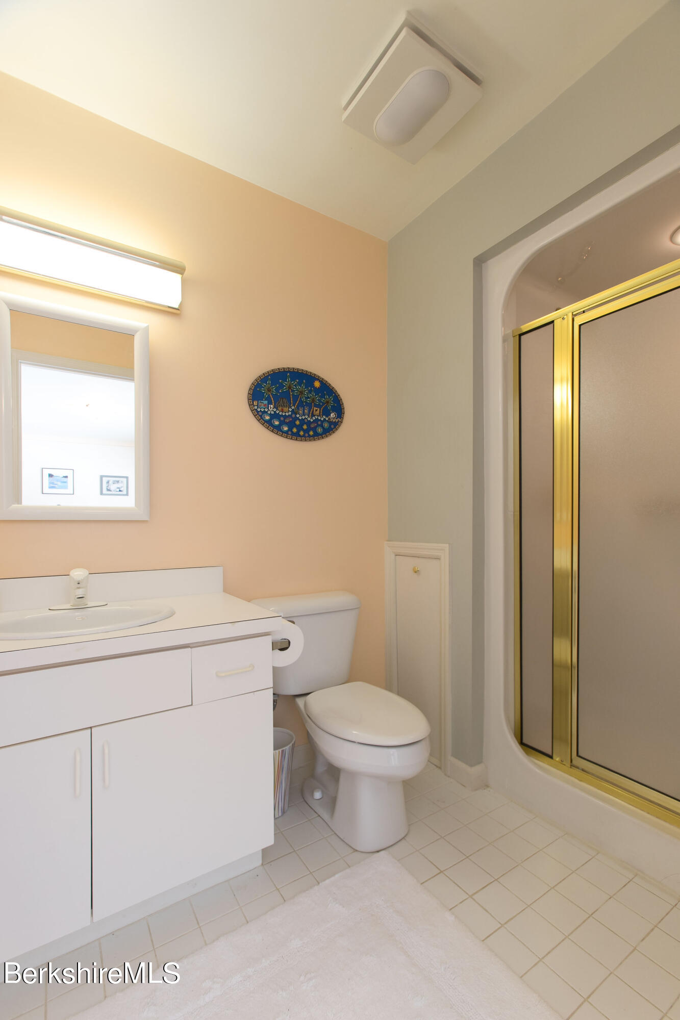 200 Old Stockbridge Road, Unit 3B Lenox, MA 01240 - Photo 25 of 36 a bathroom with a toilet a sink and mirror