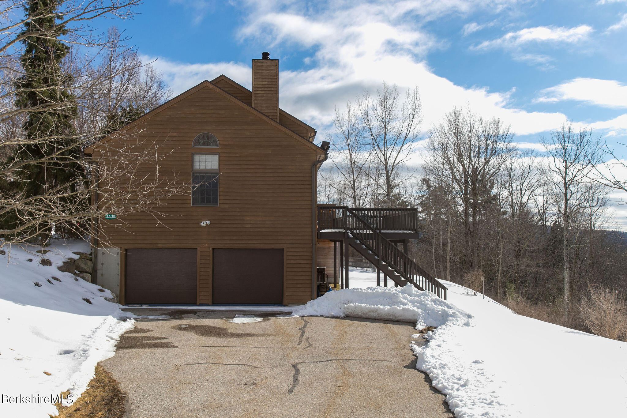 200 Old Stockbridge Road, Unit 3B Lenox, MA 01240 - Photo 32 of 36 a building with trees in front of it