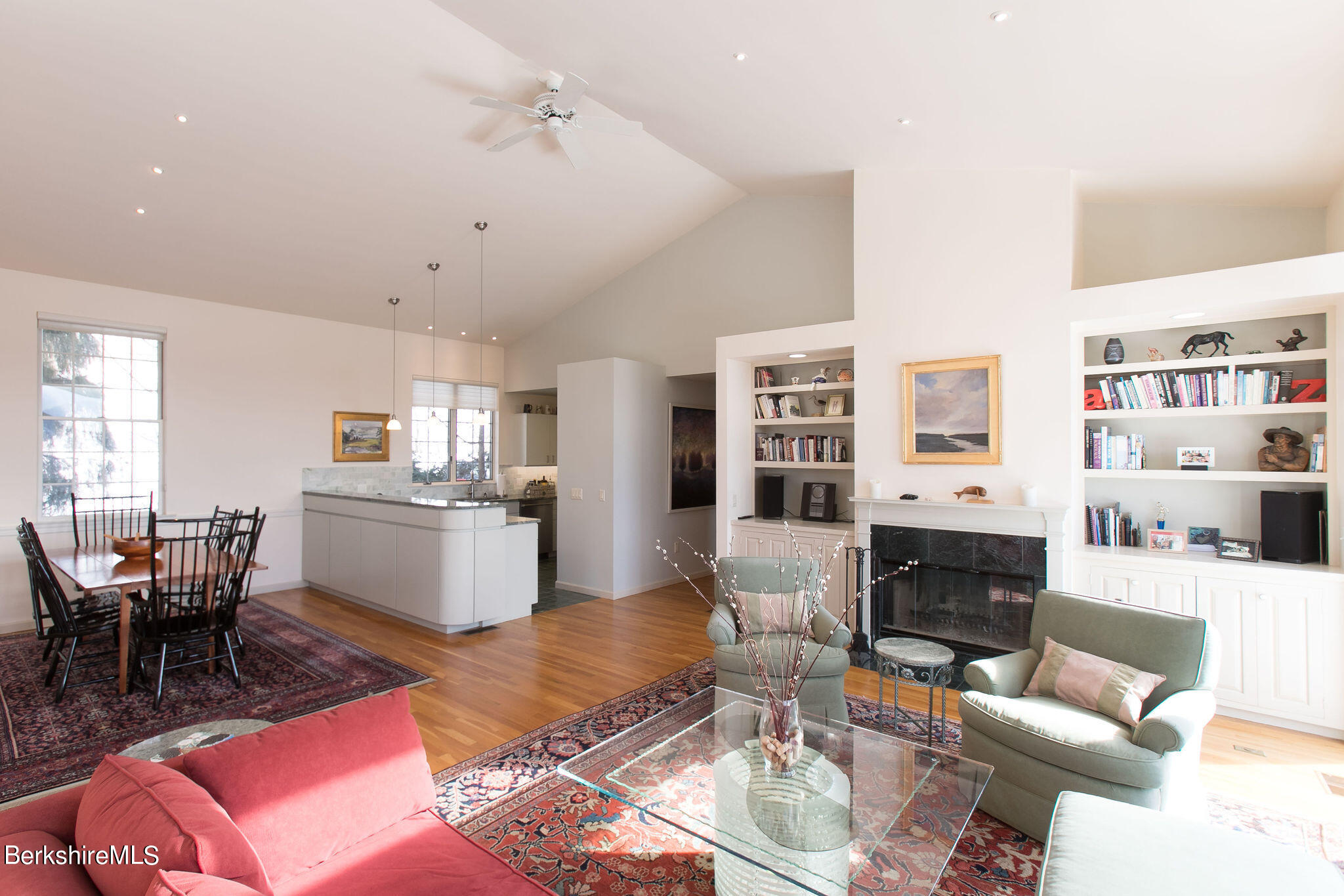 200 Old Stockbridge Road, Unit 3B Lenox, MA 01240 - Photo 4 of 36 a living room with furniture and a fireplace