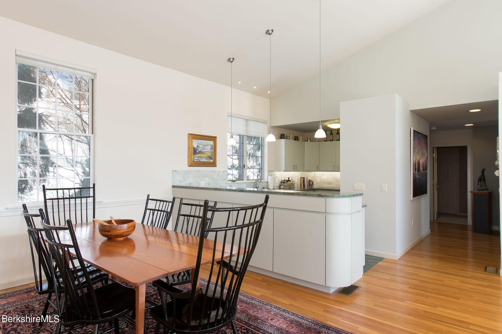 200 Old Stockbridge Road, Unit 3B Lenox, MA 01240 - Photo 5 of 36 a dining room with furniture and wooden floor