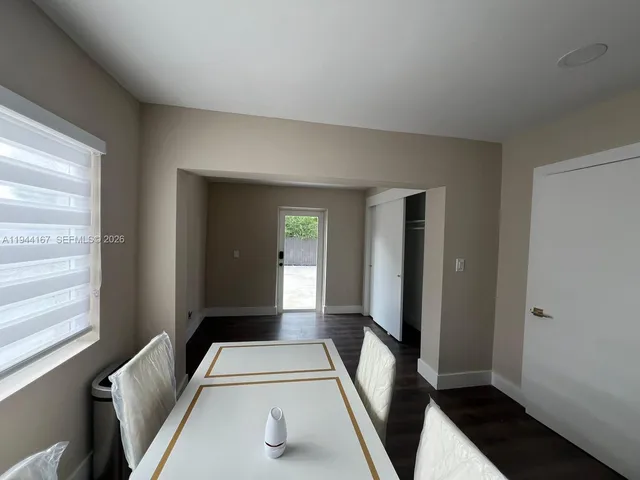 a view of a hallway with a couch