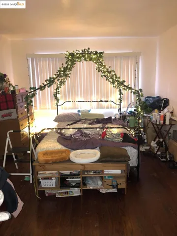 a room with gym equipment and a large window