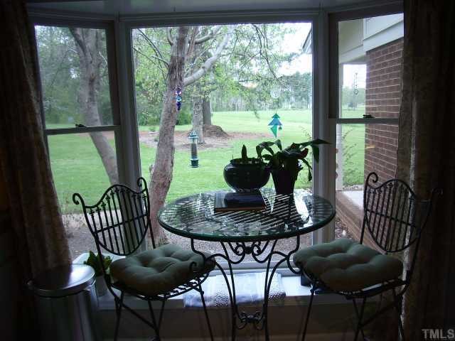 6315 Guess Road Rougemont, NC 27572 - Photo 10 of 12 a view of a dining room with furniture window and outside view