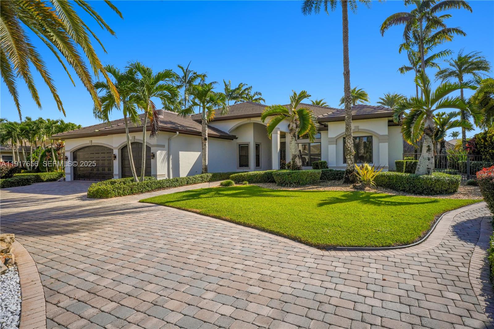 14896 Southwest 38th Street Davie, FL 33331 - Photo 1 of 60 a view of a house with a swimming pool