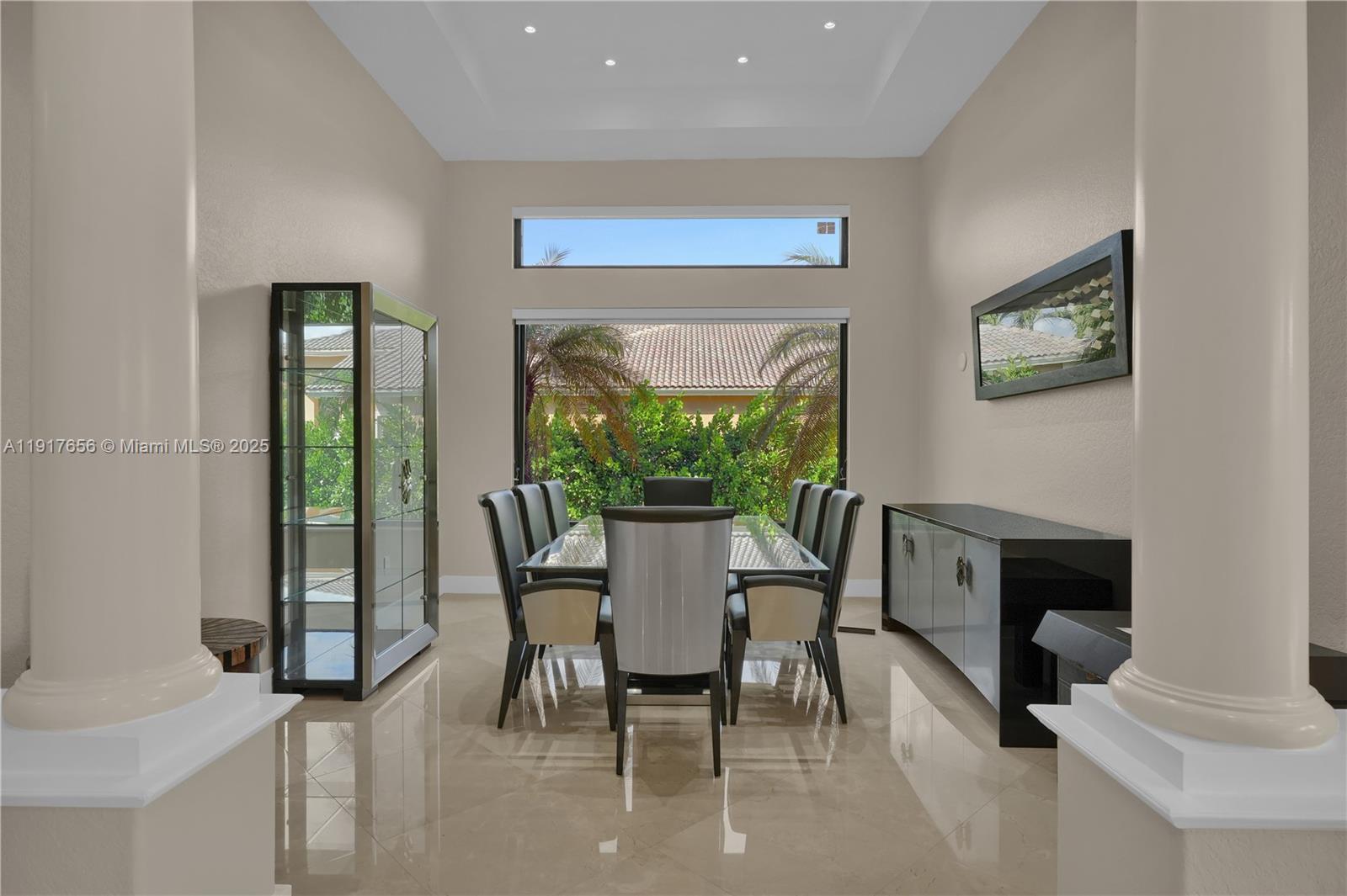 14896 Southwest 38th Street Davie, FL 33331 - Photo 16 of 60 a dining room with furniture and window