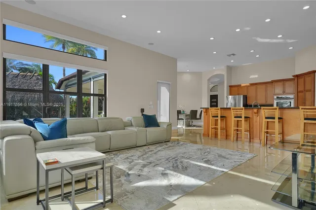 a living room with furniture and a table