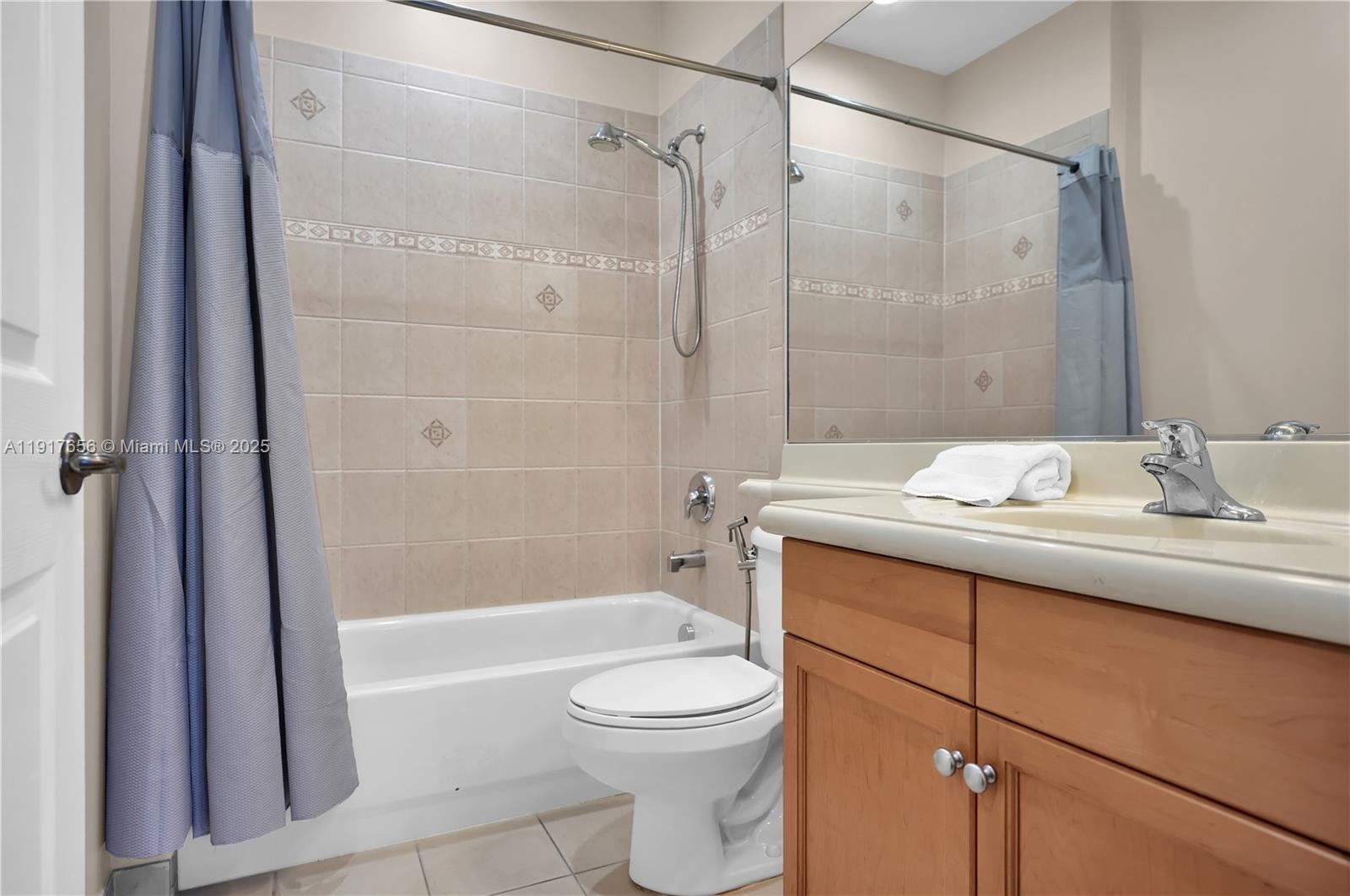 14896 Southwest 38th Street Davie, FL 33331 - Photo 33 of 60 a bathroom with a sink a toilet and shower