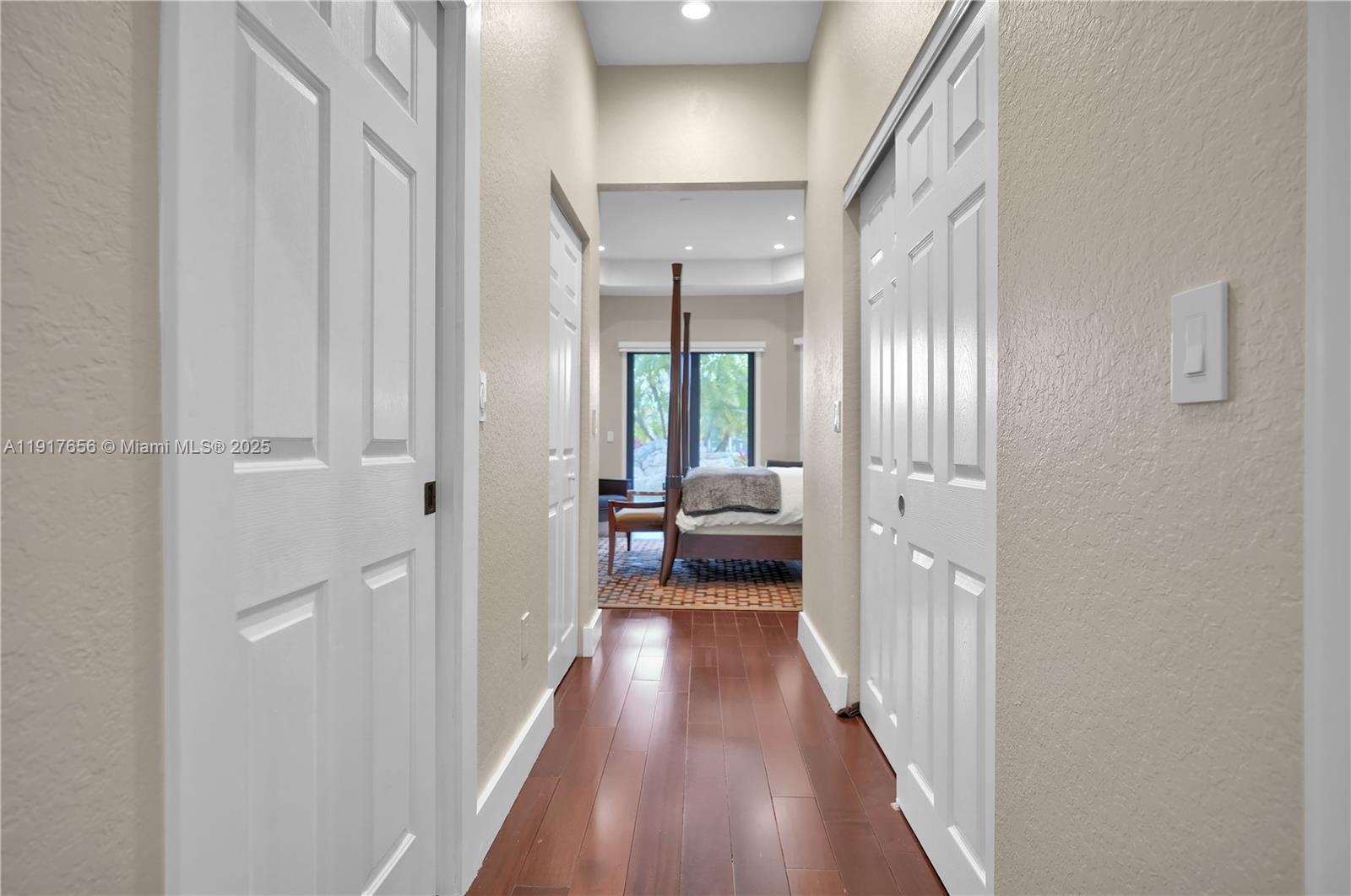 14896 Southwest 38th Street Davie, FL 33331 - Photo 34 of 60 a view of a bedroom from a hallway