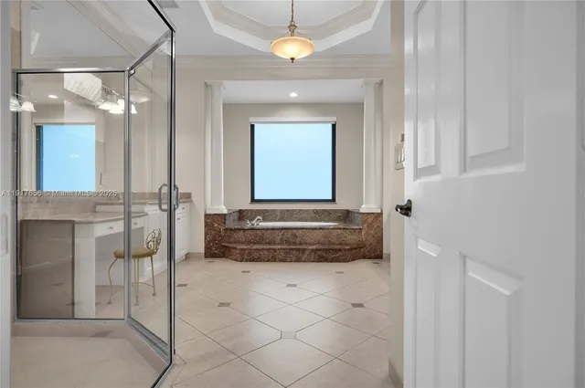 a living room with furniture and a large mirror