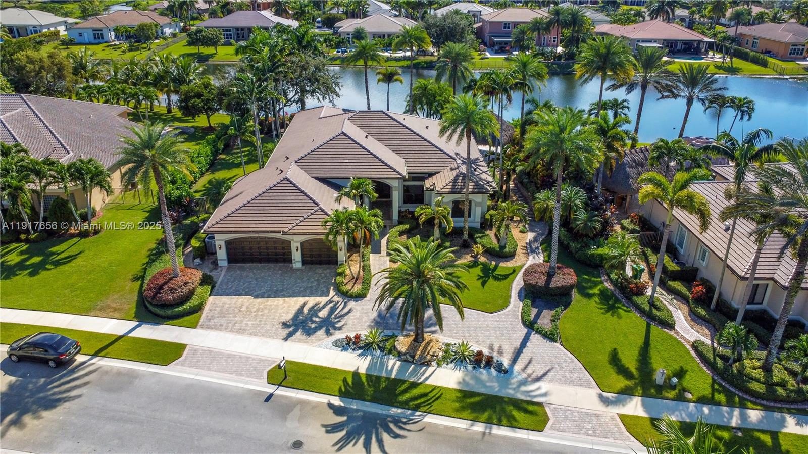 14896 Southwest 38th Street Davie, FL 33331 - Photo 6 of 60 an aerial view of a house with swimming pool garden and patio