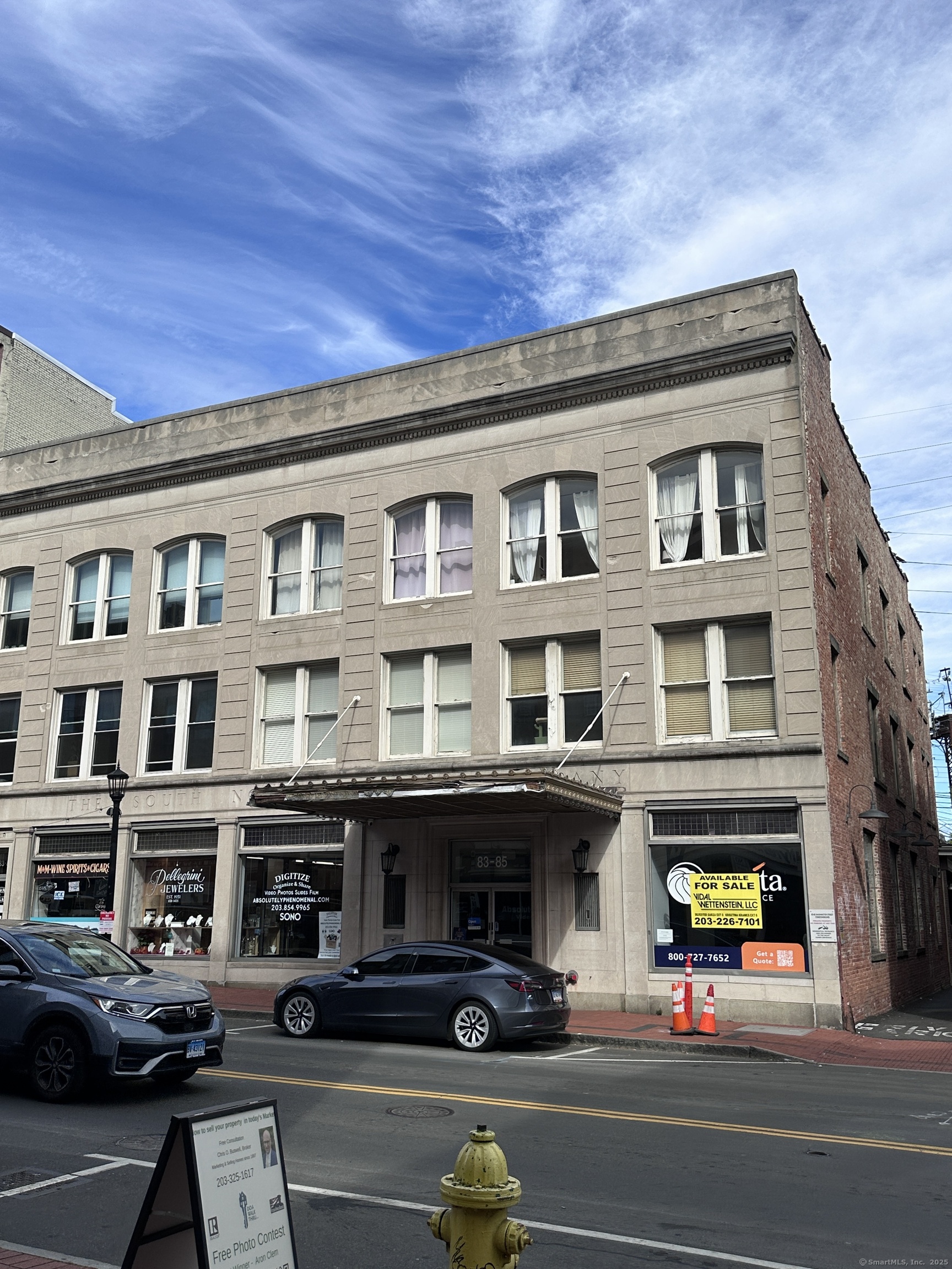 83 Washington Street, Unit 3B Norwalk, CT 06854 - Photo 1 of 12 a view of building with car parked