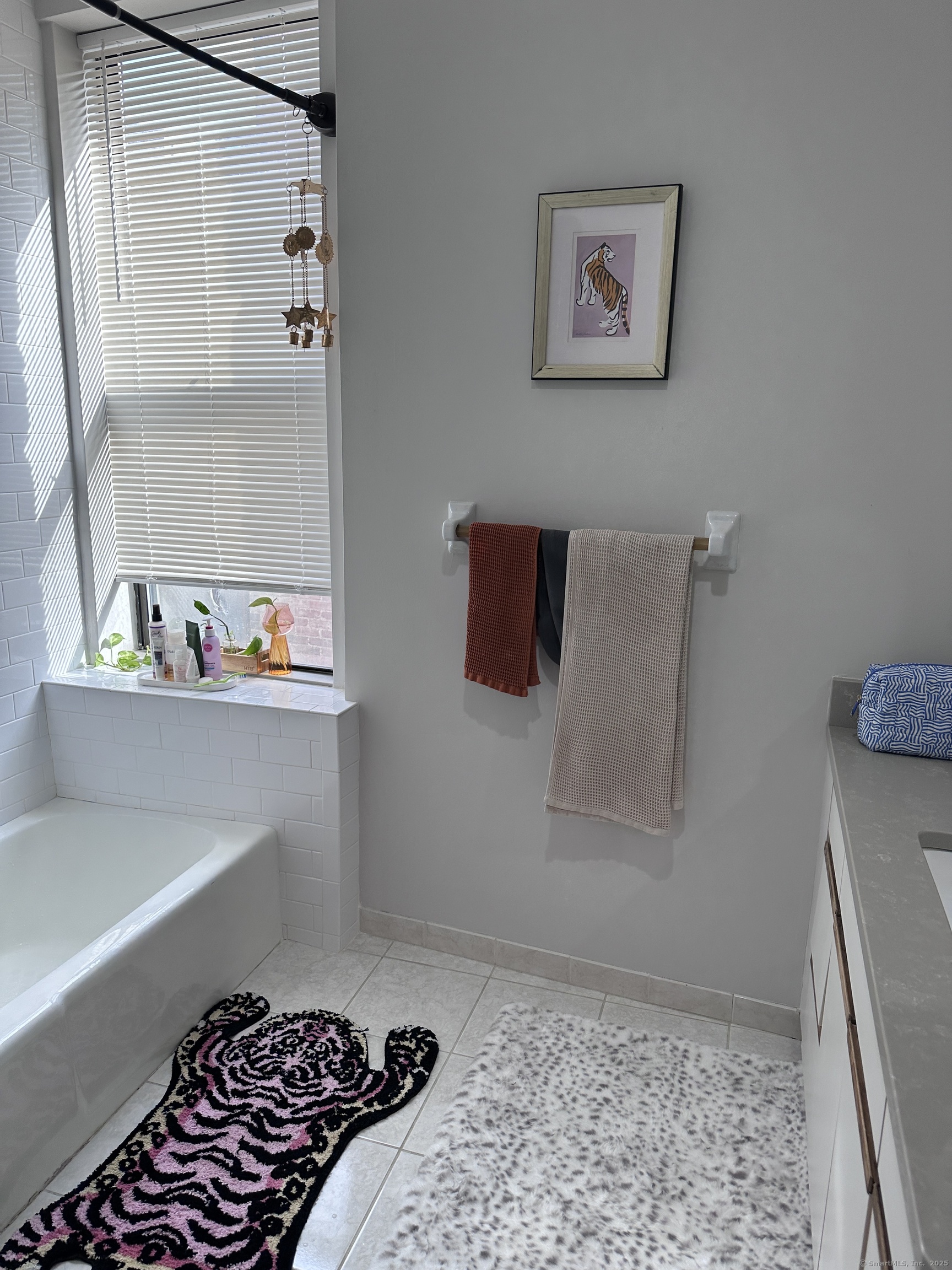 83 Washington Street, Unit 3B Norwalk, CT 06854 - Photo 2 of 12 a bedroom with a bed and a window