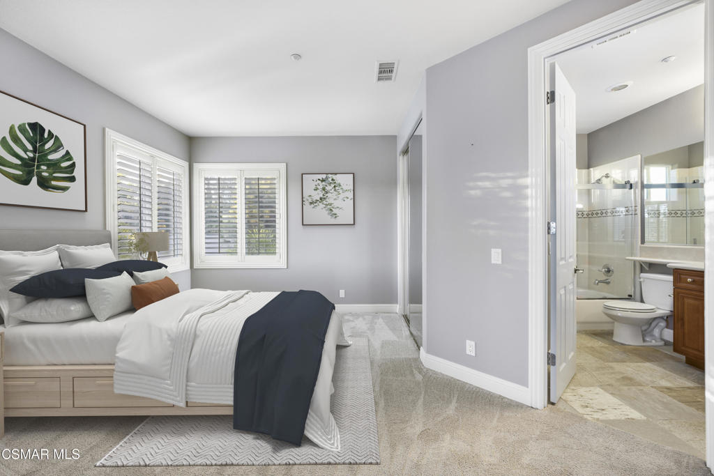 12364 Palmer Drive Moorpark, CA 93021 - Photo 16 of 31 a bedroom with a bed and a view of bathroom