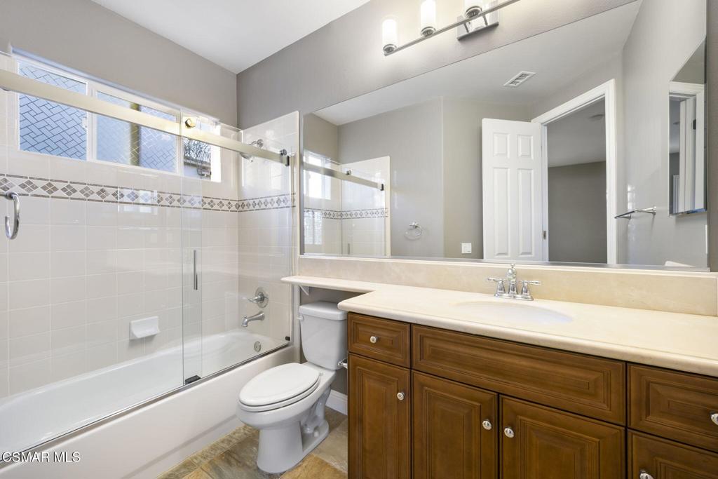12364 Palmer Drive Moorpark, CA 93021 - Photo 17 of 31 a bathroom with a sink a toilet and shower