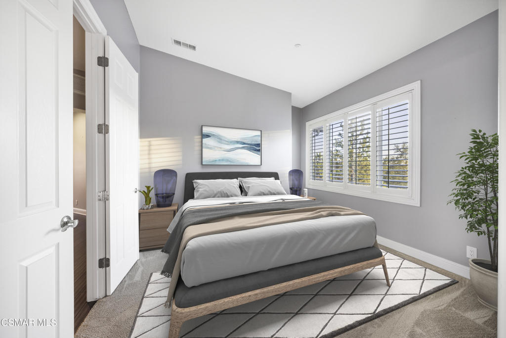 12364 Palmer Drive Moorpark, CA 93021 - Photo 18 of 31 a bedroom with a bed and windows