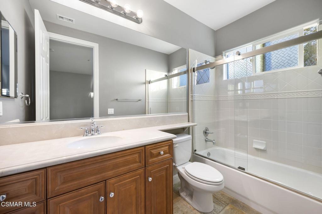 12364 Palmer Drive Moorpark, CA 93021 - Photo 19 of 31 a bathroom with a sink a toilet and shower