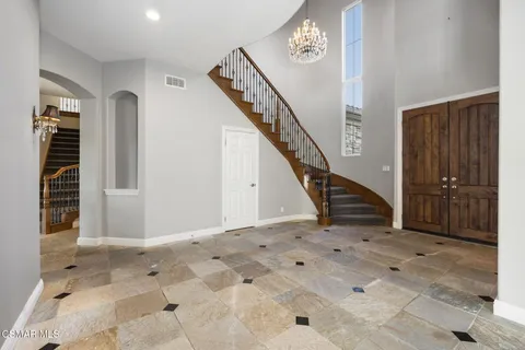 a view of an entryway with staircase