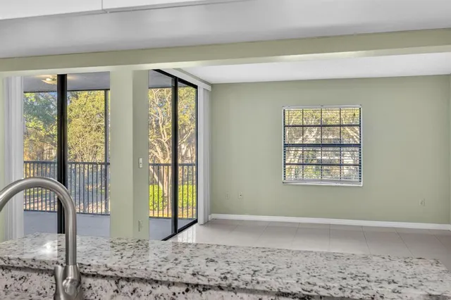 a view of a livingroom with a large window