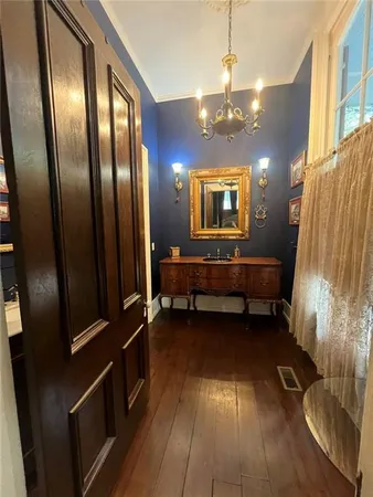 a bathroom with a sink a mirror and a toilet