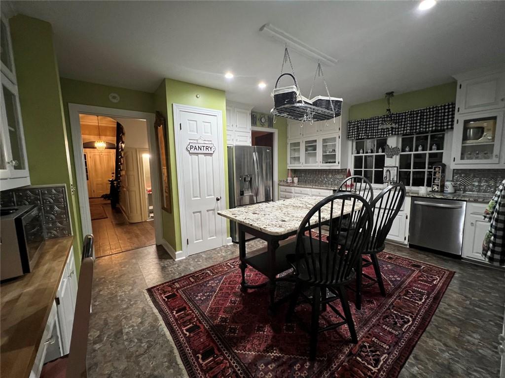 1710 Country Club Road Eufaula, AL 36027 - Photo 30 of 44 a view of a dining room with furniture