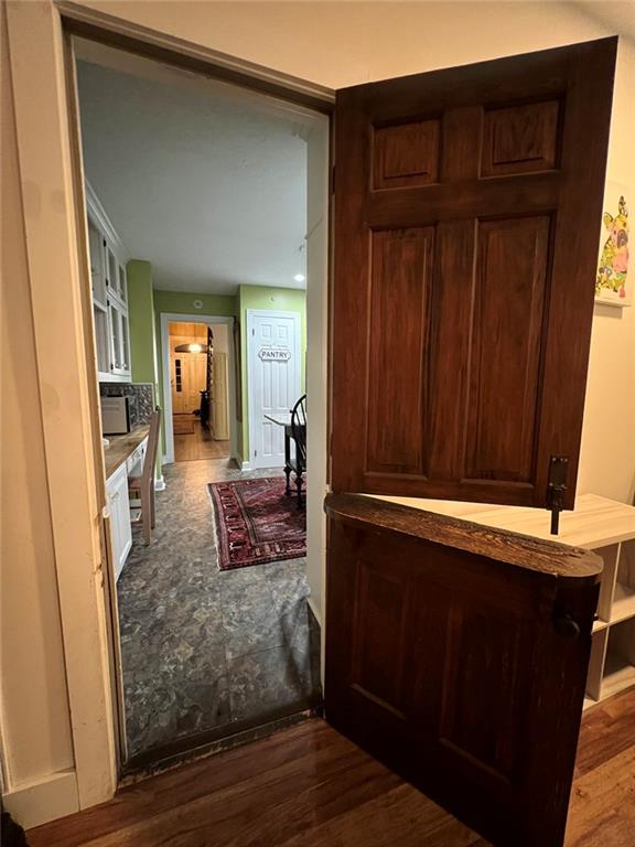 1710 Country Club Road Eufaula, AL 36027 - Photo 36 of 44 a view of a hallway with wooden floor and furniture