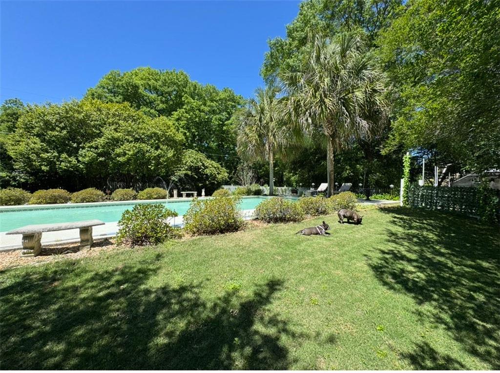 1710 Country Club Road Eufaula, AL 36027 - Photo 40 of 44 a backyard of a house with lots of green space