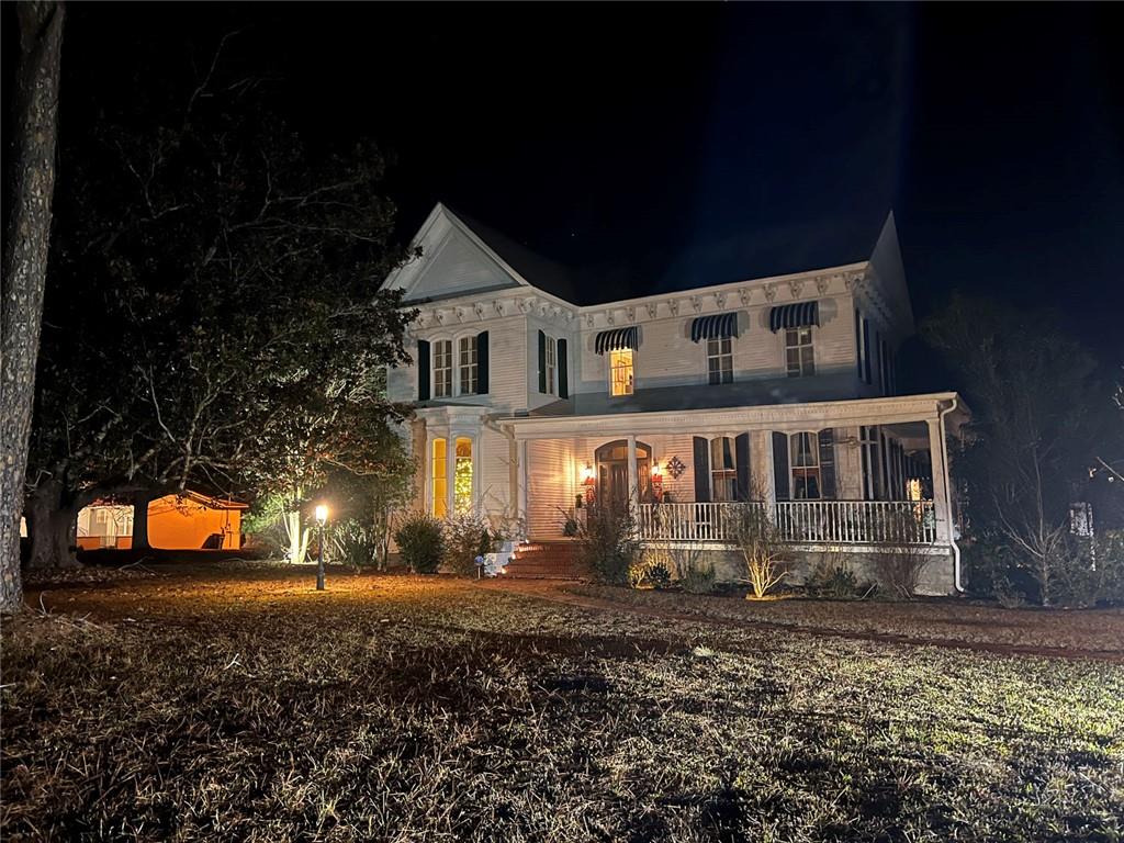 1710 Country Club Road Eufaula, AL 36027 - Photo 41 of 44 front view of a house with a yard