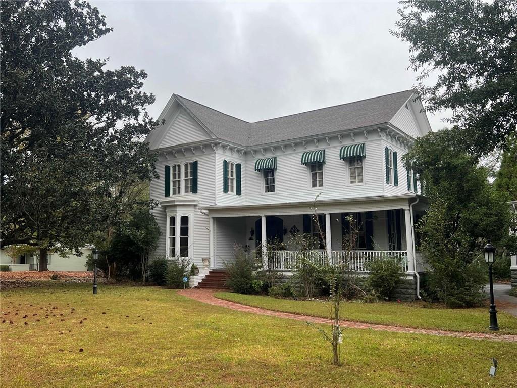 1710 Country Club Road Eufaula, AL 36027 - Photo 44 of 44 a front view of a house with a yard