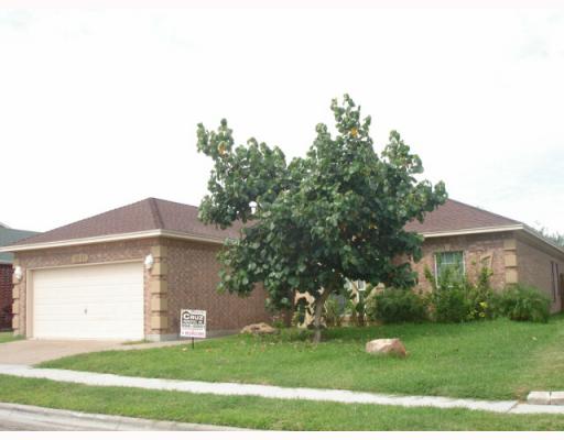 3141 Quail Springs Road, Unit 7 Corpus Christi, TX 78414 - Photo 1 of 4 a view of a house with a yard