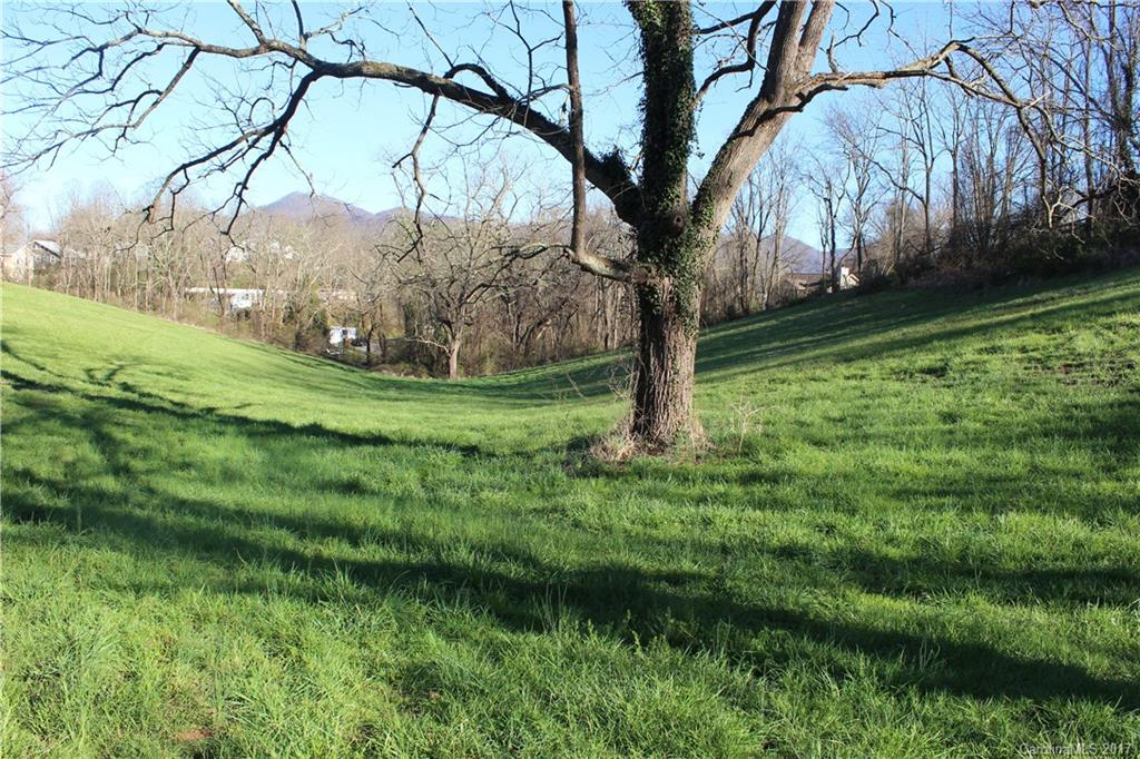 26 Star Ridge Road Canton, NC 28716 - Photo 1 of 17 a backyard of a house with lots of green space
