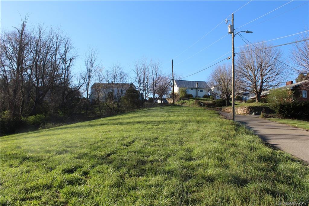 26 Star Ridge Road Canton, NC 28716 - Photo 11 of 17 a view of a field of grass and trees