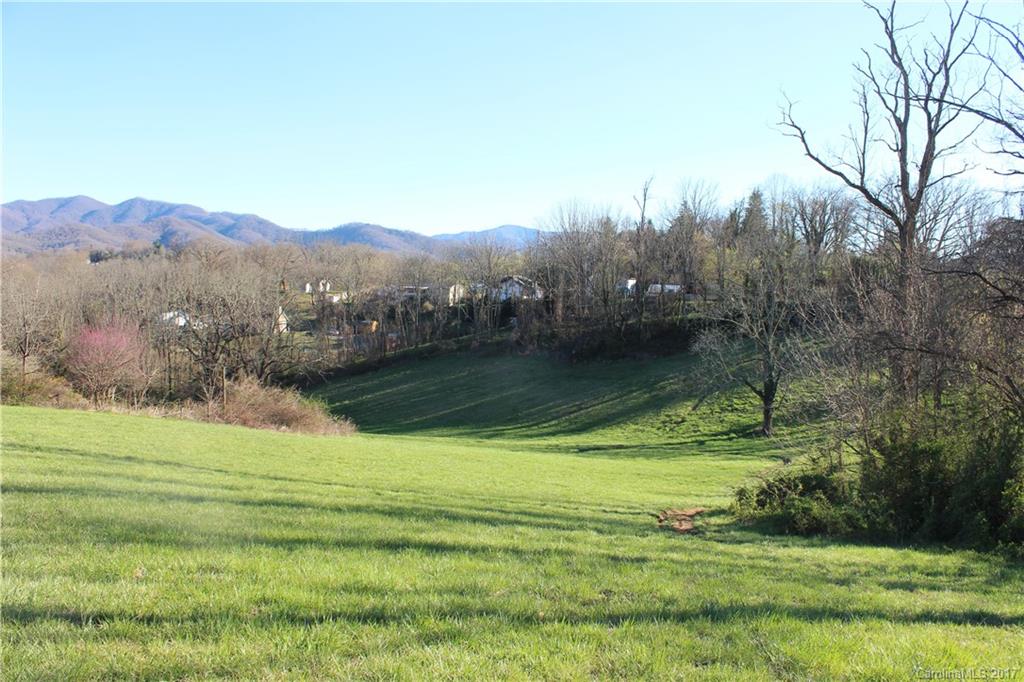 26 Star Ridge Road Canton, NC 28716 - Photo 8 of 17 a view of a golf course with an ocean