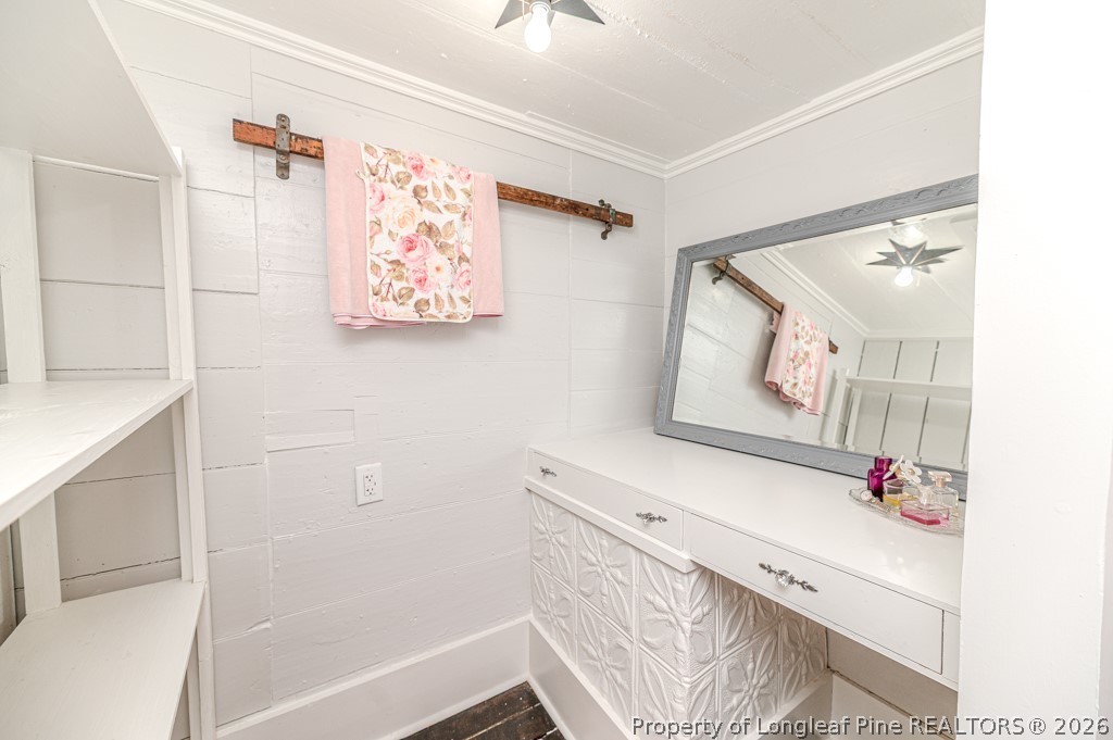 509 Carthage Street Cameron, NC 28326 - Photo 17 of 43 a bathroom with a bathtub and a shower