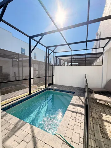 an aerial view of residential house with outdoor space