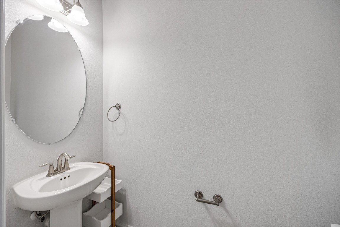 32906 Ruthie Dean Drive Brookshire, TX 77423 - Photo 11 of 23 a bathroom with a sink and mirror
