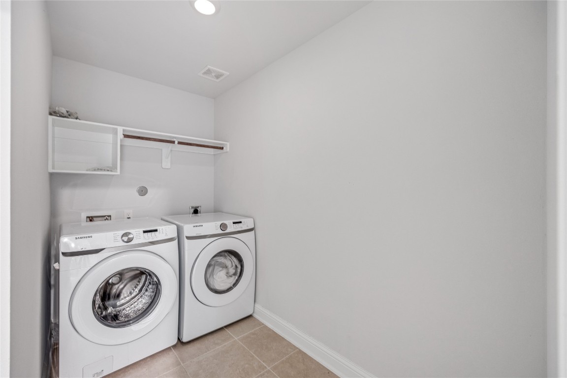 32906 Ruthie Dean Drive Brookshire, TX 77423 - Photo 12 of 23 a utility room with dryer and washer