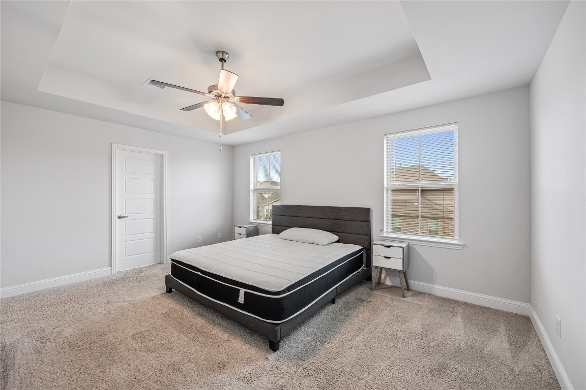 32906 Ruthie Dean Drive Brookshire, TX 77423 - Photo 17 of 23 a bed sitting in a room next to a window